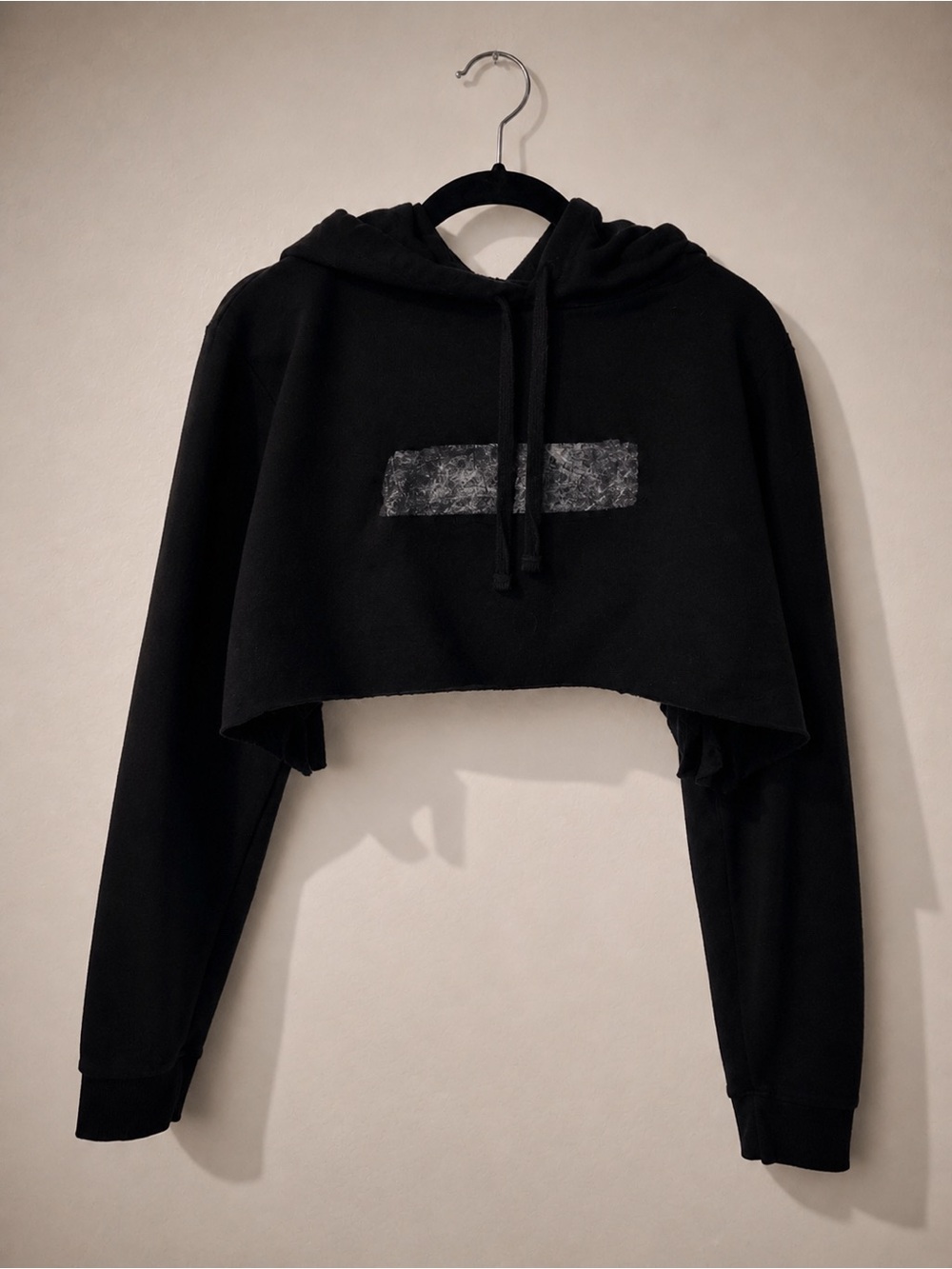 Fringed Backless Cropped Black Hoodie with Distressed Gray Patch and